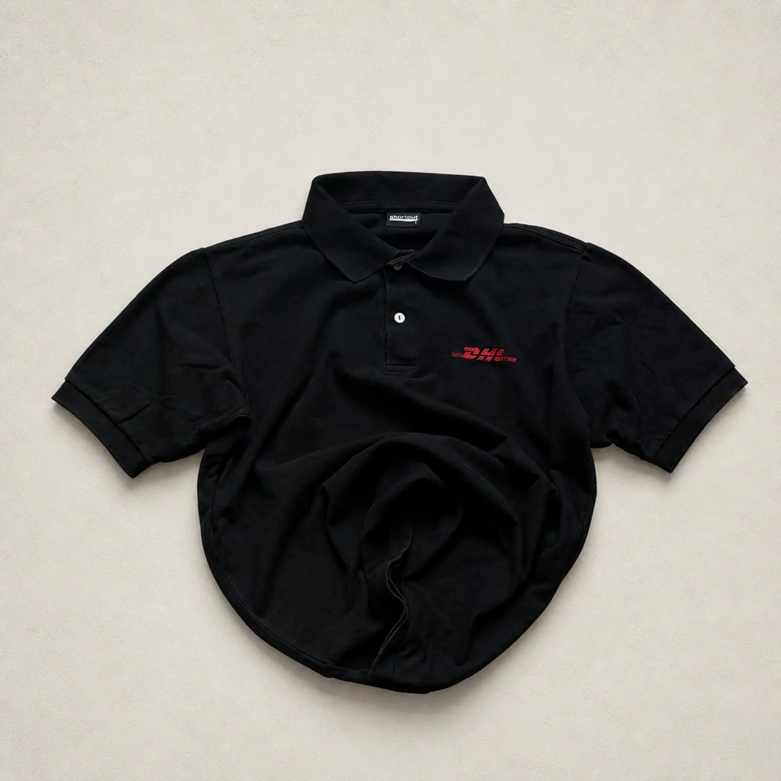 Shortcut — Black DHL Uniform Polo